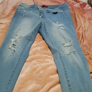 Wax skinny jeans distressed